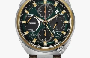 Citizen Promaster Tsuno Chrono Racer kronograf med silverfärgat stålhölje, guldtoner, mörk grönsvart urtavla, brunläderarmband och tachymeterskala.